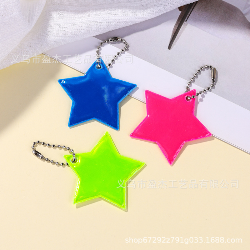 Amazon 5 cm colgante de color reflectante estrella de PVC de noche colgante de bolsas de llaves