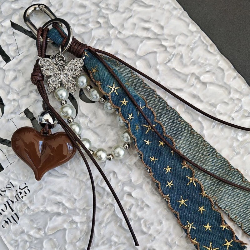 Miu-Style Bag Pendant with a Post-Apocalyptic Vibe, High-End Brown Butterfly Heart Denim Simple Braided Rope Keychain for Women Miu-Style Bag Pendant with a Post-Apocalyptic Vibe, High-End Brown Butterfly Heart Denim Simple Braided Rope Keychain for Women