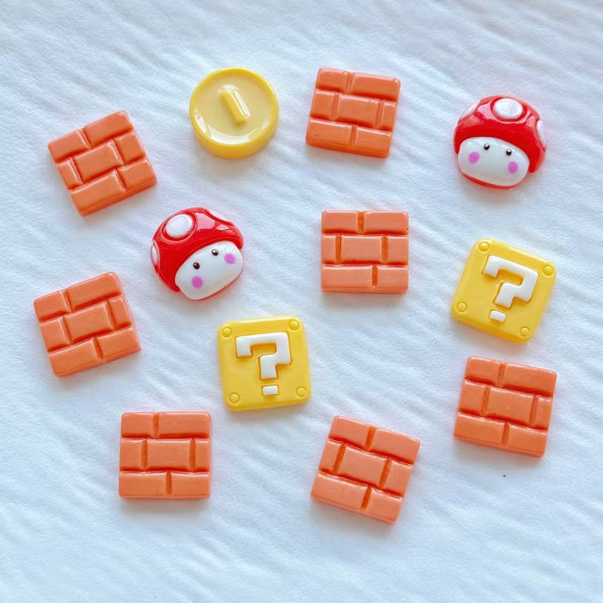 Juegos clásicos de la infancia serie de dibujos animados DIY accesorios de resina agujero zapatos pinzas de pelo caja de teléfono celular joyas parches