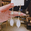 Design earrings, cat's eye, trend of season, internet celebrity