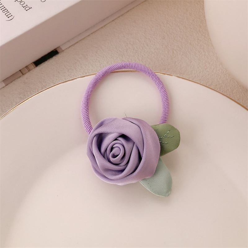 Historia de rosa amarilla coreana flor anillo de cabello cuerda de cabeza de alta sensación suave dulce camellia cuerda de cabello correa tocado