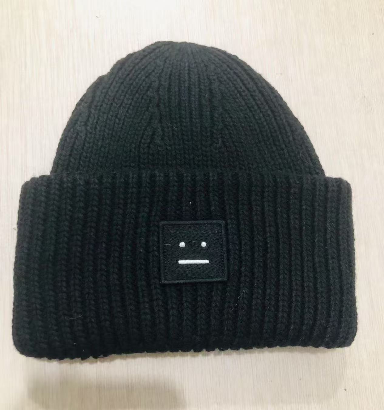 AC笑顔の帽子の四角のラベルを貼って、ウールの北欧風の冷たい帽子の韓国版のカップルの毛糸の帽子の高品質の冷たい帽子を巻きます。