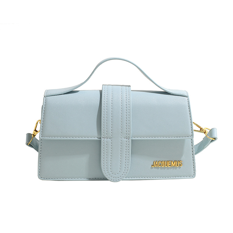 Temperamento simple color sólido flip bolso 2025 nuevo bolso de viaje de alta calidad de mujer gran capacidad mochila