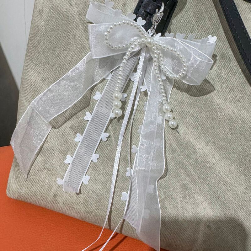 Korean Style Super Fairy White Ribbon Bow Pearl Keychain Bag Sweet Lace Belt Bag Pendant Chanel Style Korean Style Super Fairy White Ribbon Bow Pearl Keychain Bag Sweet Lace Belt Bag Pendant Chanel Style