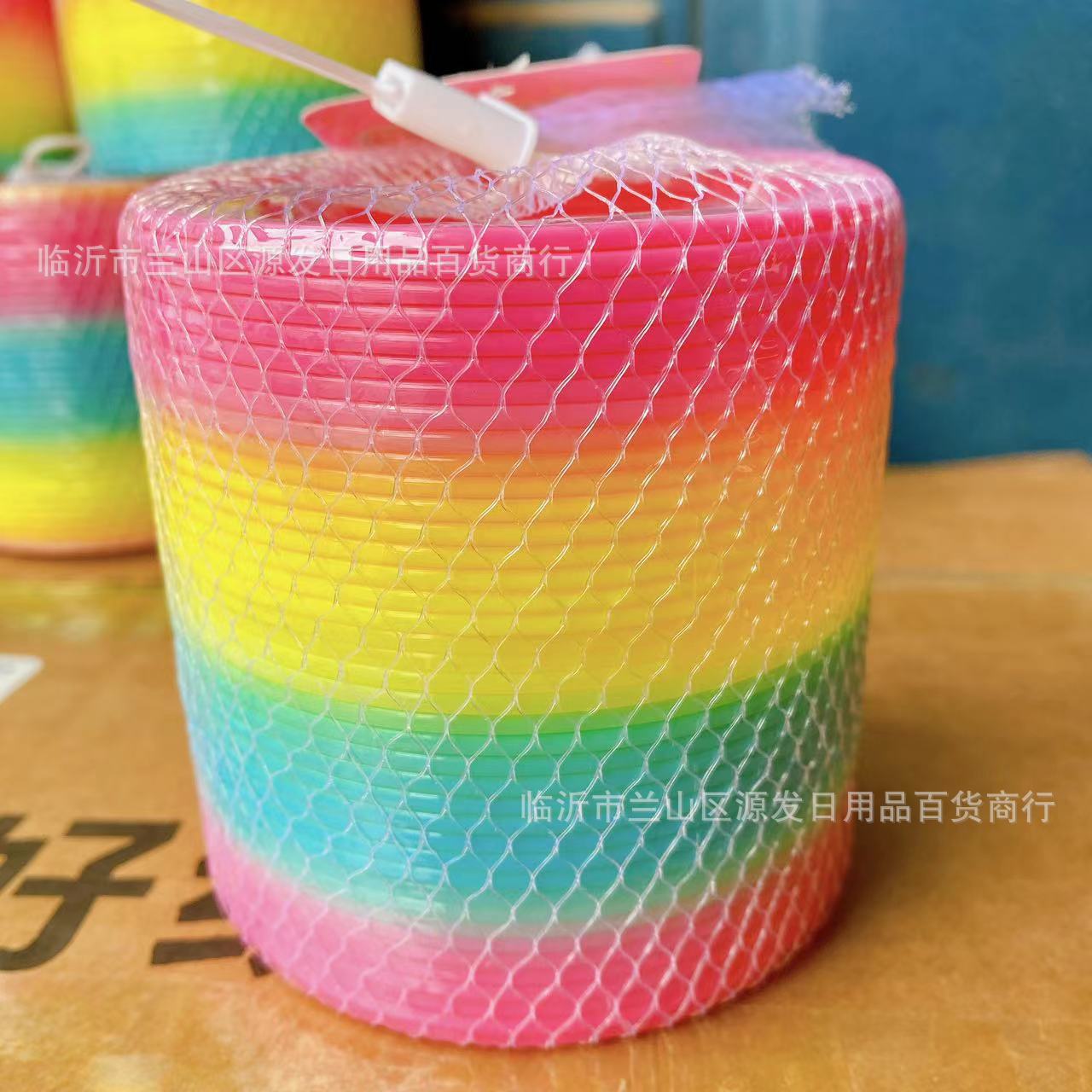 Gran anillo de arco iris puesto Venta caliente al por mayor 8,7*9cm anillo de arco iris niños primavera mágica hula hoop juego de rompecabezas
