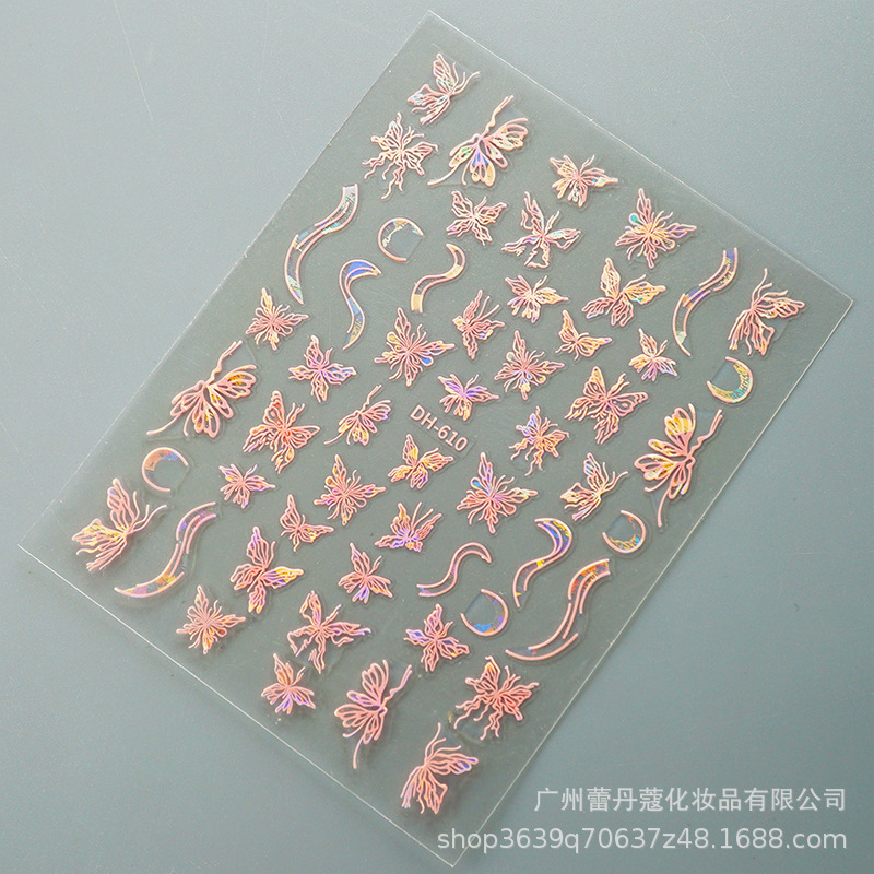 爆発的なネイルシールの上品な半透明な白い花びらの蝶のカラフルなオーロラガラスの破片には、ゴムの爪がついています|undefined