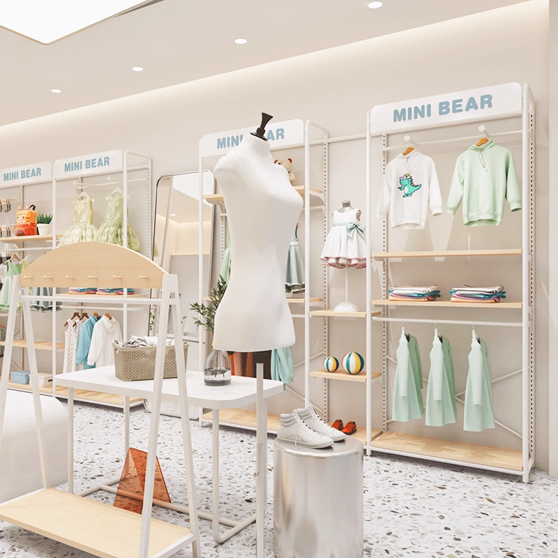 Tienda de ropa infantil tipo piso estante de exhibición para ropa infantil tienda de ropa de madres y bebés estante de exhibición de ropa de hierro forjado