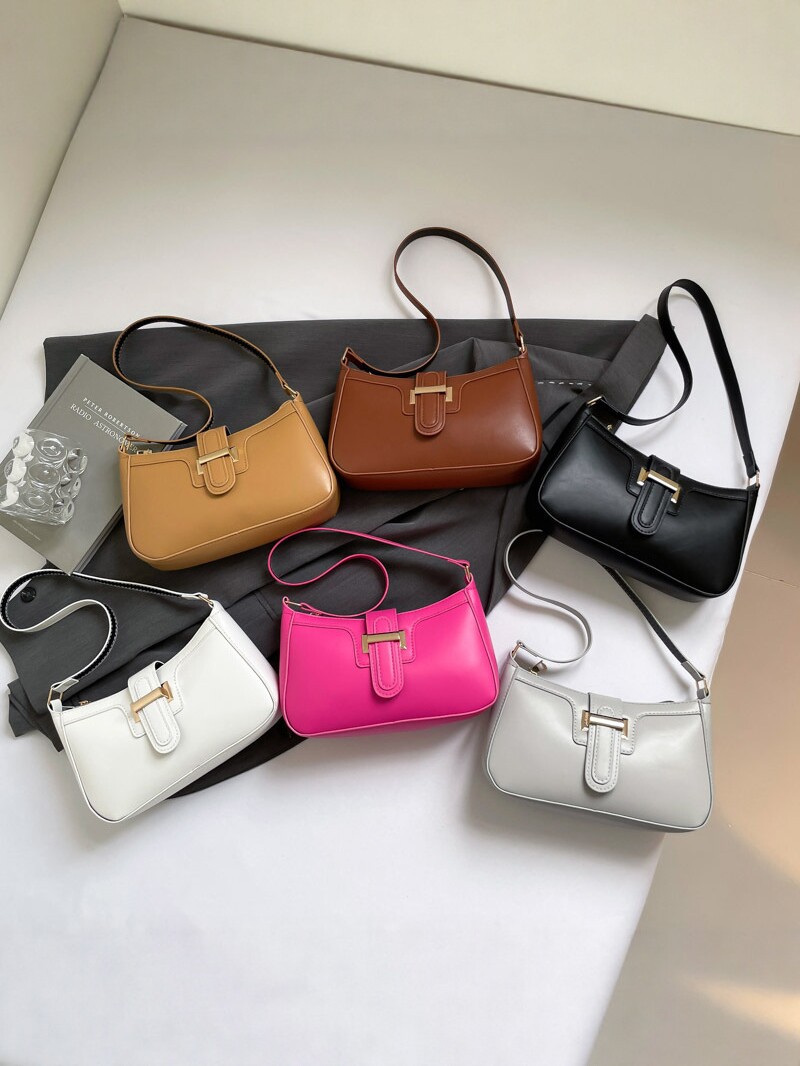 2025 nueva moda versátil bolso de brazo de mujer sensación de alto nivel bolso de hombro simple nicho de diseño de mano de viaje
