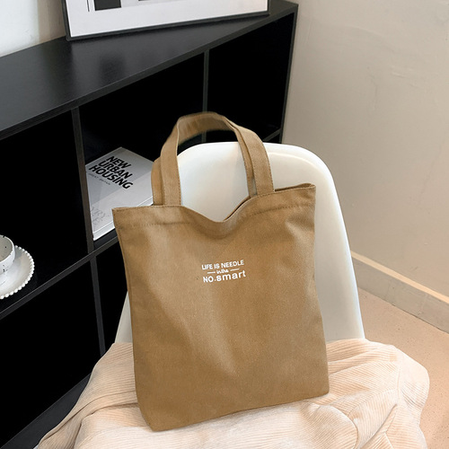 帆布包女文创国潮竖款斜挎包男生小背包ins单肩包学生风小包包