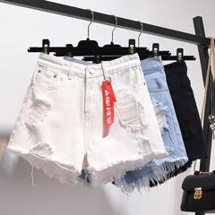 ハイウエストの白いデニムの半ズボンの女性の夏の新型のゆったりした穴のギャルの大きいサイズの広い足の薄いタイプのa字の熱いズボン