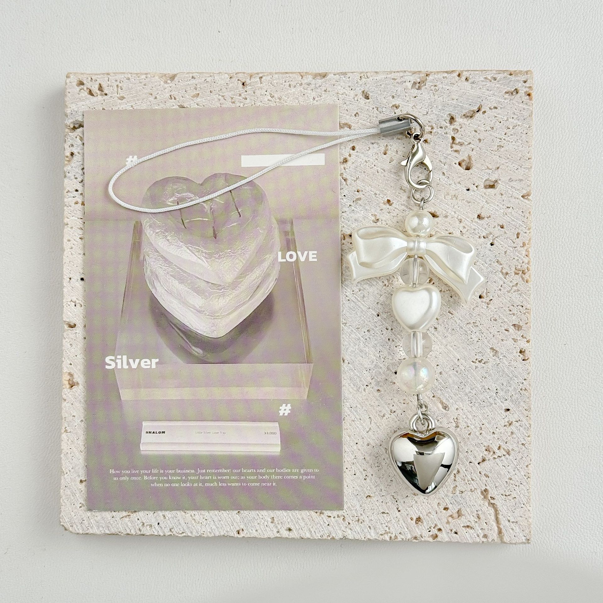 Nicho de arco simple coreano dulce perla plata amor cadenas de teléfono móvil Goku bolsa colgar llaveros