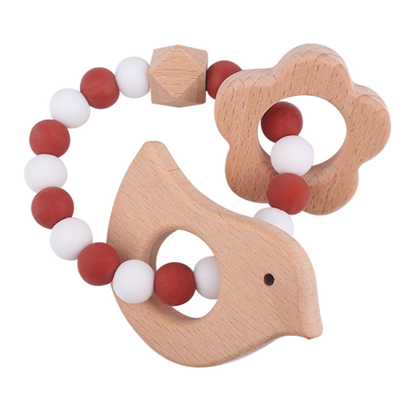 Nuevo bebé dibujos animados pájaros pulsera de madera de haya juguetes creativos pulsera de dientes de silicona pulsera de dientes