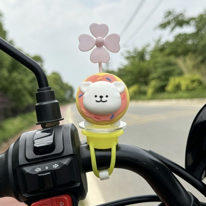 Bicycle dog figurine, windmill line dog ornament, electric vehicle decoration, cute motorcycle accessory