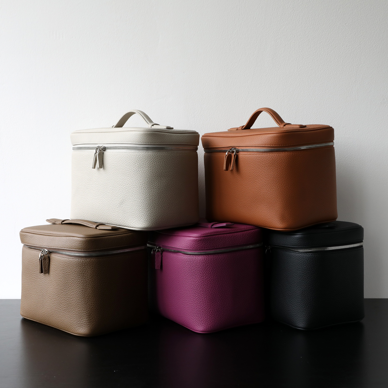 Capacious leather handheld storage system