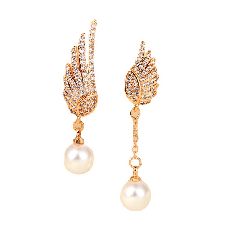 Explosión de sonido de vibración asimétrica alas perlas perlas de moda femenina temperamento elegante amplio aretes de pendientes de bordilla larga