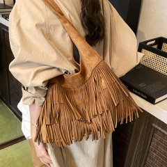 超火小众豹纹包包女2025秋冬季新款流苏单肩腋下包手提托特水桶包