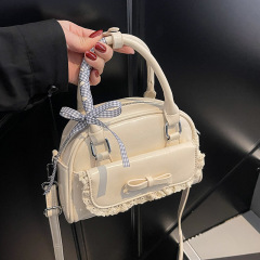 夏の超火の小さい大衆の蝶結びの包みの女性2025新型の斜めのショルダーバッグの高級感があります。
