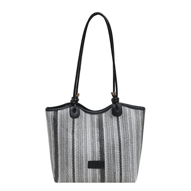 2026 nueva bolsa de tejido para mujeres de gran capacidad de viaje bolso de hombro portátil a rayas de moda bolso de mochila
