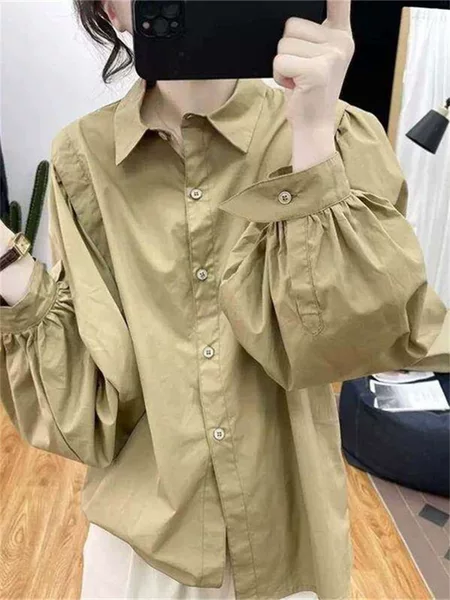 Stylish solid-color polo-neck lantern-sleeve shirt for women, perfect for spring and autumn, with a loose fit that slims the figure, offering a chic and versatile casual look
