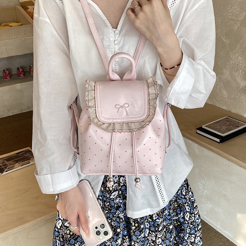 Mochila de estilo plateado de gran capacidad de viento de hoja de loto para mujeres nuevas olas de viaje de laterales de la mochila de estudiantes 2026 fiesta