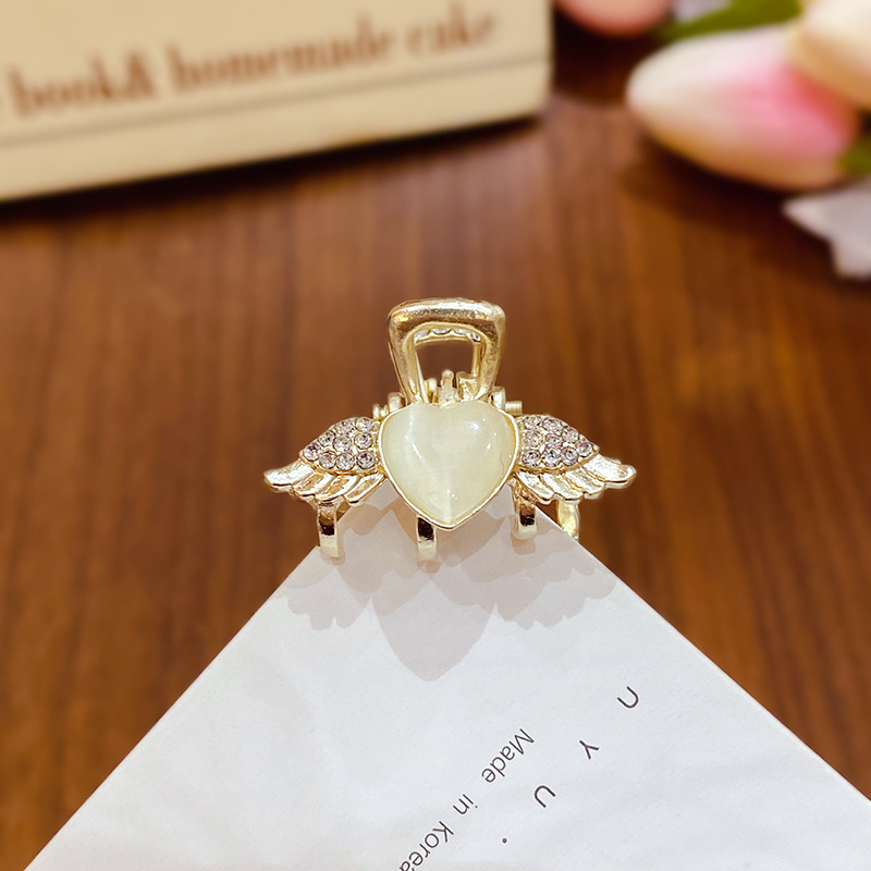 Ojo de gato alas-diamantes de imitación