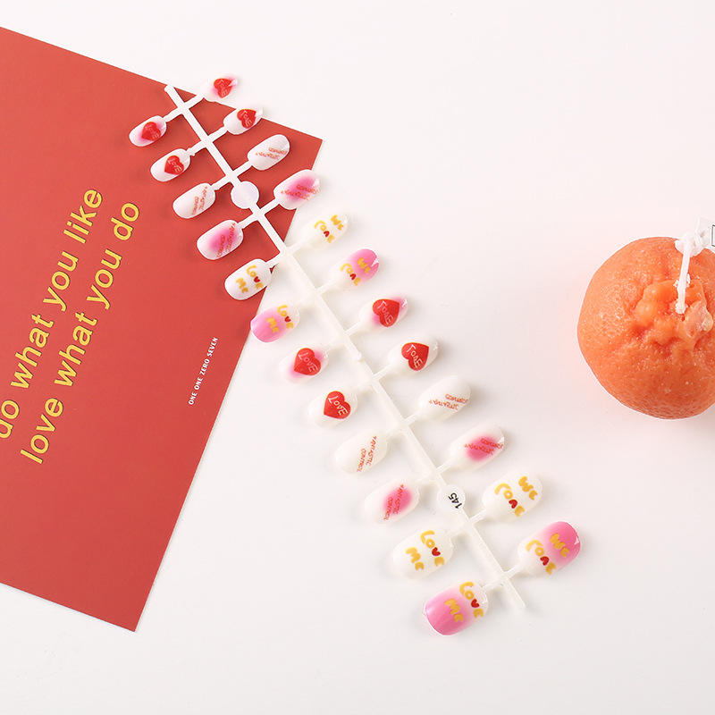 Nuevo desgaste de los niños uñas color amor niños uñas pegatinas patrón simple pintado de uñas en stock comercio exterior exclusivo