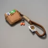 Egg box + yellow egg + brown rope