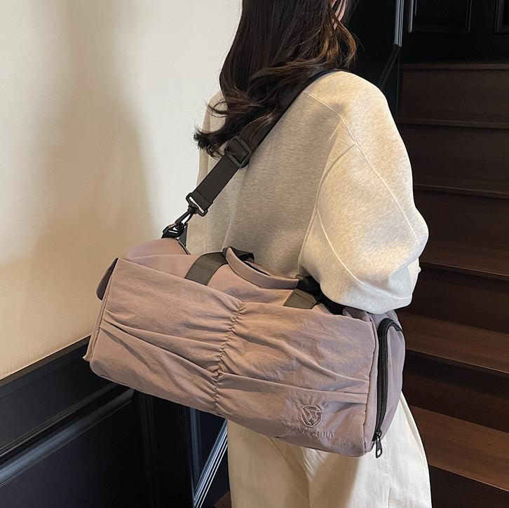 Bolso deportivo coreano transfronterizo femenino 2025 nueva bolsa de almacenamiento separada seca y húmeda bolsa de viaje de viaje