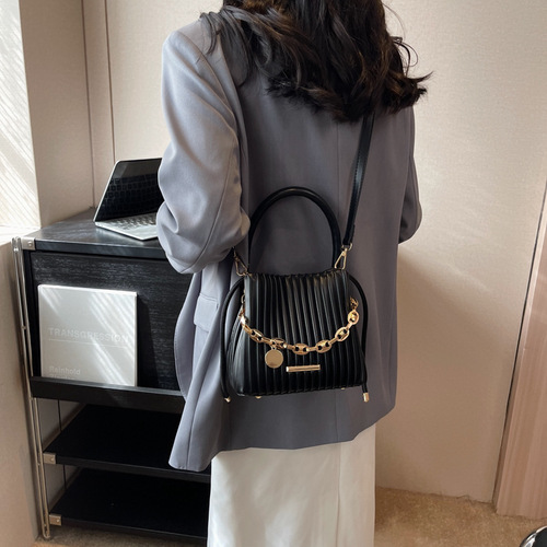 Hand-held pleated bag for women summer  new trendy fashion niche bucket bag versatile ins shoulder crossbody bag