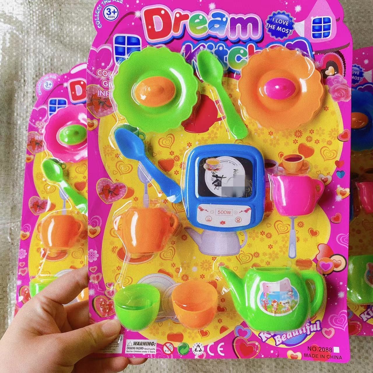 Juguetes para niños para el hogar combinación de tarjetas de succión al por mayor DIY simulación de recipientes de agua potable tazas tetera 2 yuanes tienda por departamentos