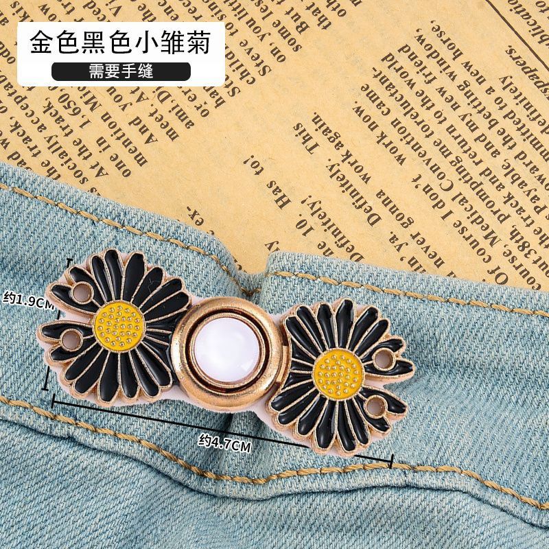 금색 배경에 작은 검은 데이지