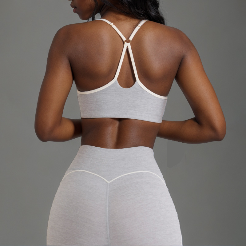 Procesamiento personalizado OEM comercio exterior europeo y americano transfronterizo belleza espalda deporte contraste color sujetador melocotón cadera alta cadera elástica pantalones de yoga