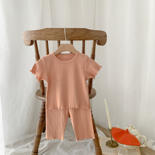 Korean children's clothing summer single color hollow breathable fungus-edged short-sleeved stretch comfortable home clothes set for boys and girls