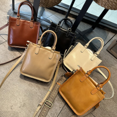 2024 Spring New Single Shoulder Crossbody Bag Square Handheld Women's Leather Minority Small Handbag Women's Commute Tote Bag