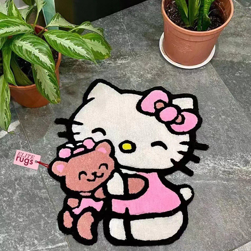 곰을 안고 있는 kt 고양이