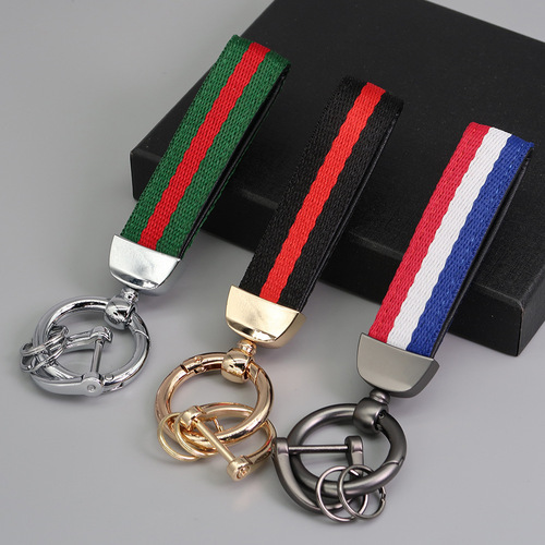 Cross-border hot selling three-color nylon webbing keychain leather key chain pendant car color strip key lanyard
