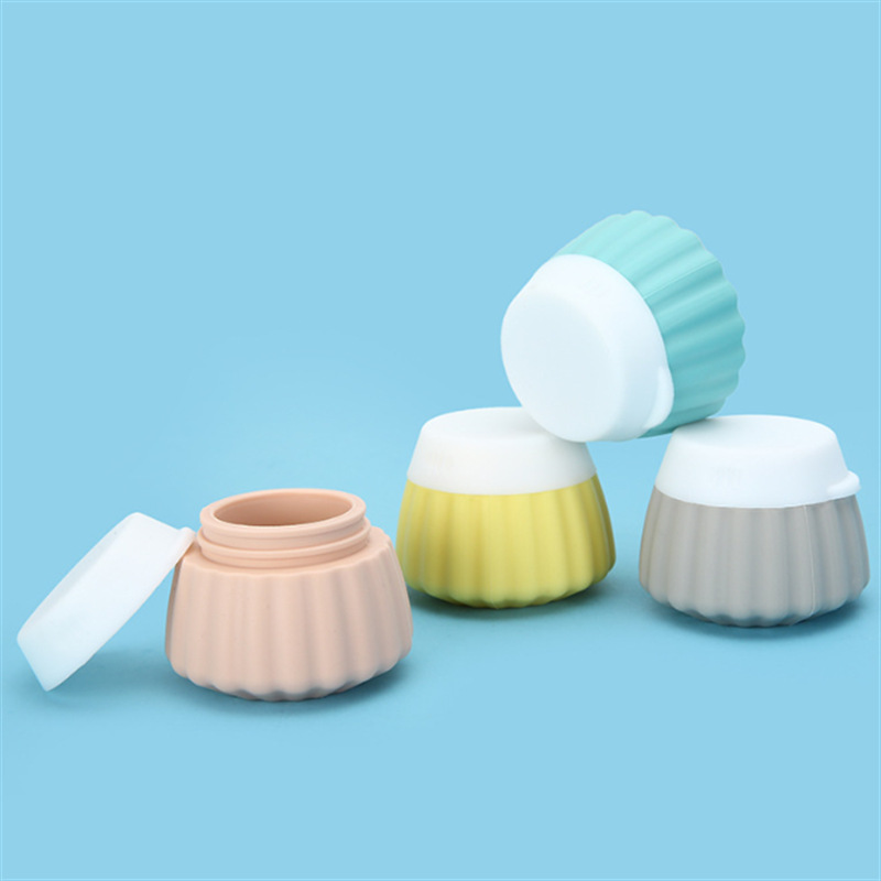 便携式旅行硅胶分装瓶洗脸刷两用清洁去角质防爆防漏挤压面霜瓶