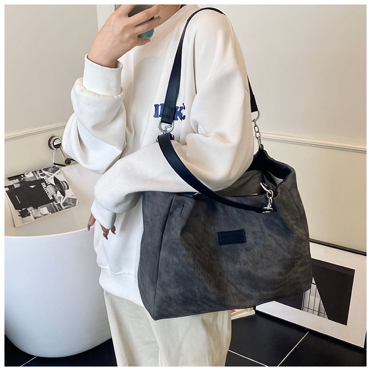Korean style simple and versatile bag for women, new summer 2025 fashion and niche handbag, large capacity tote bag for commuting undefined