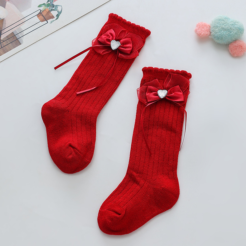 Calcetines de las niñas al por mayor de primavera y otoño calcetines de media pantorrilla de bebé niños de arco calcetines de princesa rojo brillante un mes de edad festivo