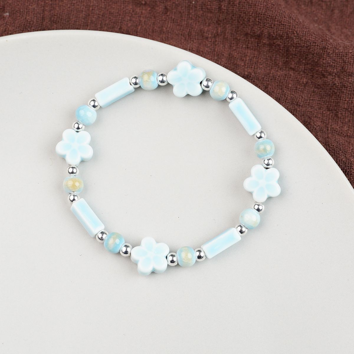 Jingdezhen pulsera de cerámica de verano mujer alta sensación galletas serie de gatos nicho diseño universal pulsera alta sensación
