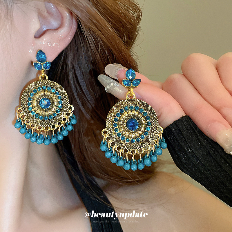 Pendientes de borla de gota de agua de diamantes de estilo étnico Pendientes de diseño de viajes de nicho retro femenino Pendientes de lujo ligero de alta gama