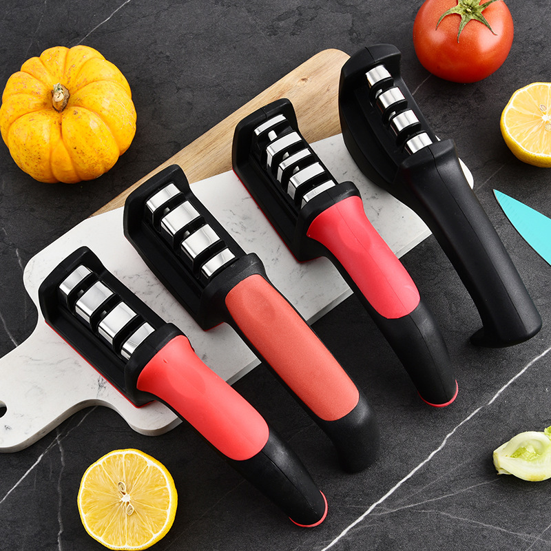 Fábrica mayorista de acero inoxidable doméstico multifuncional tres o cuatro piezas afiladora de cuchillo de cocina manual afiladora