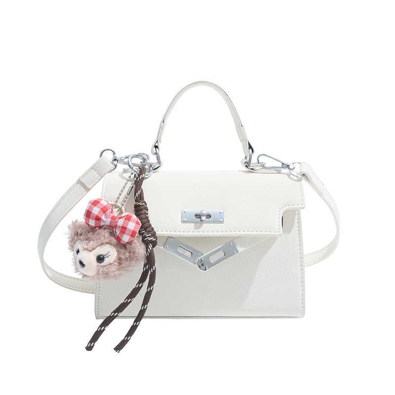 Bolsos de nuevo estilo de verano para mujer 2025 moda de alta calidad bolso de mensajero de un solo hombro bolso de Kelly portátil de nicho
