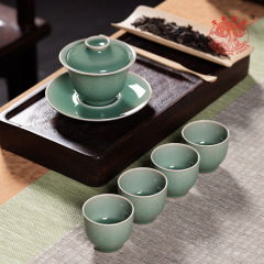 竜泉青磁の携帯の工夫の茶器の1碗の4杯のセットの陶磁器の手の蓋の碗の主人はお茶を入れます。