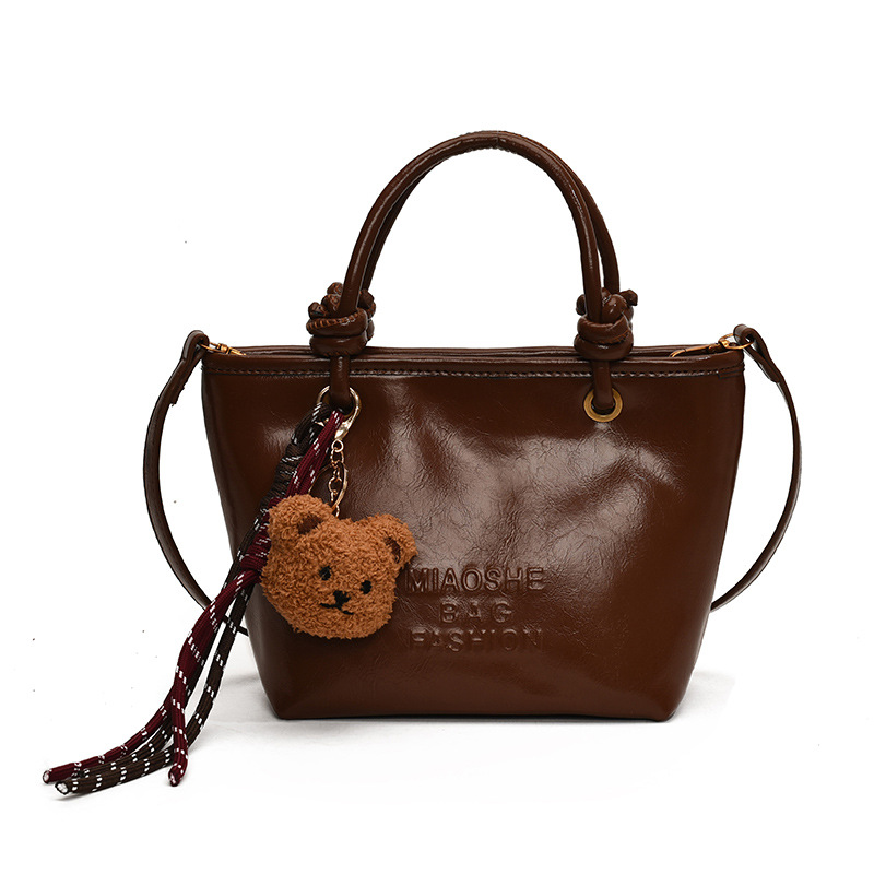 Bolsos de balde casuales retro de mano para mujeres otoño y invierno 2024 nueva moda moda bolso de hombro de alta calidad bolso de nicho de mujer