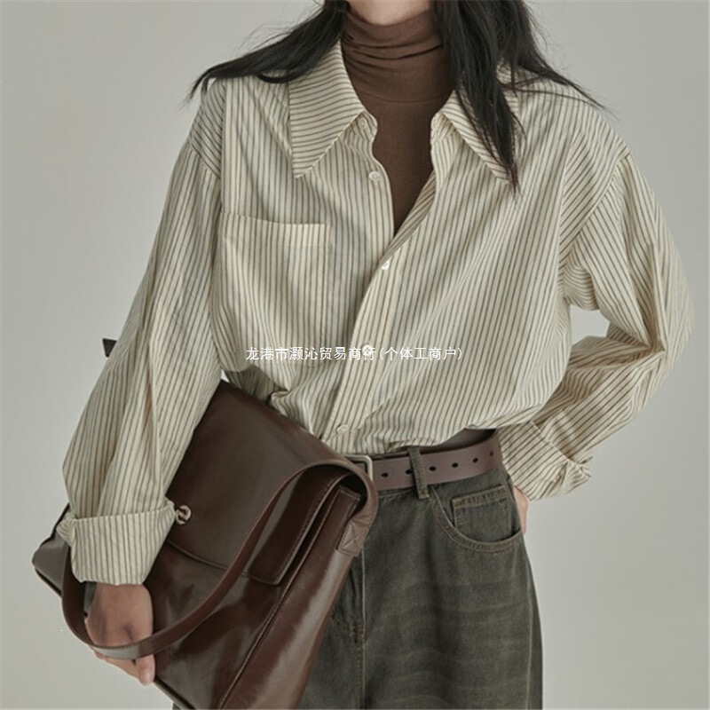 Spring and autumn blue vertical striped women's long-sleeve shirt, layered wear, 2026 new design, niche retro base shirt Spring and autumn blue vertical striped women's long-sleeve shirt, layered wear, 2026 new design, niche retro base shirt