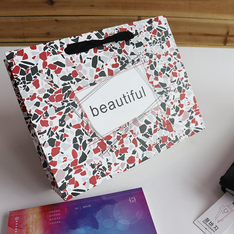 现货白卡纸袋手提袋批发高档简约服装店情人节民族风礼物礼品袋子