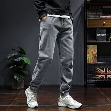 春秋大码牛仔裤男宽松弹力加大加宽加肥松紧腰束脚哈伦裤子男潮流