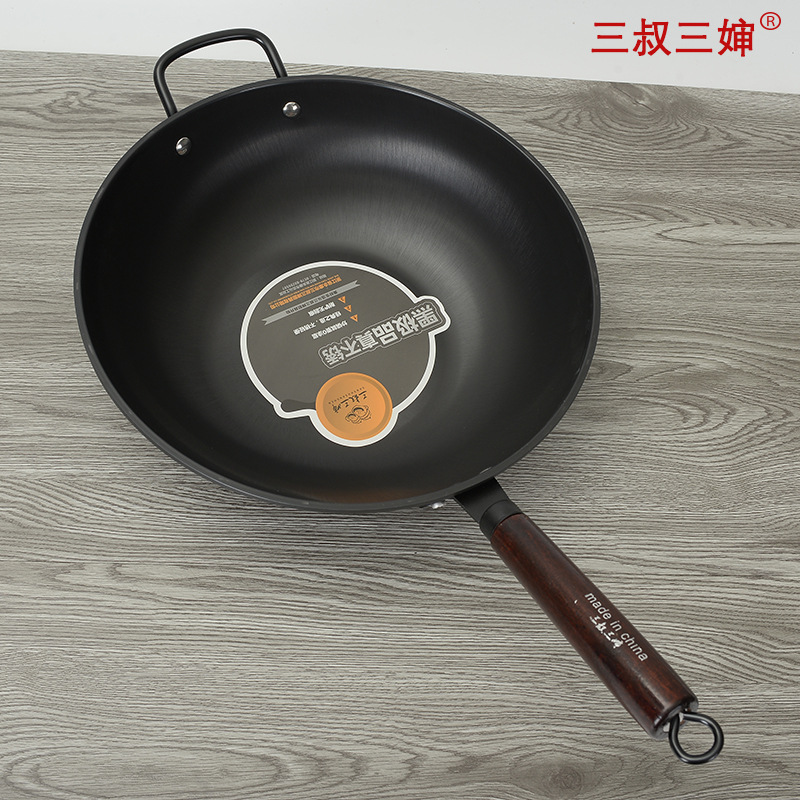 Tres tío tres tía wok hogar no recubierto de acero inoxidable real cocina de hierro pan estufa de gas Cocina de Inducción olla universal
