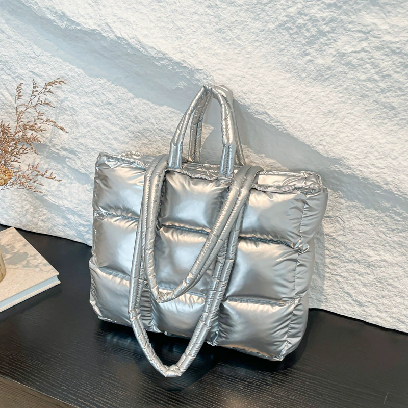 Glossy nylon quilted handheld shoulder bag with down